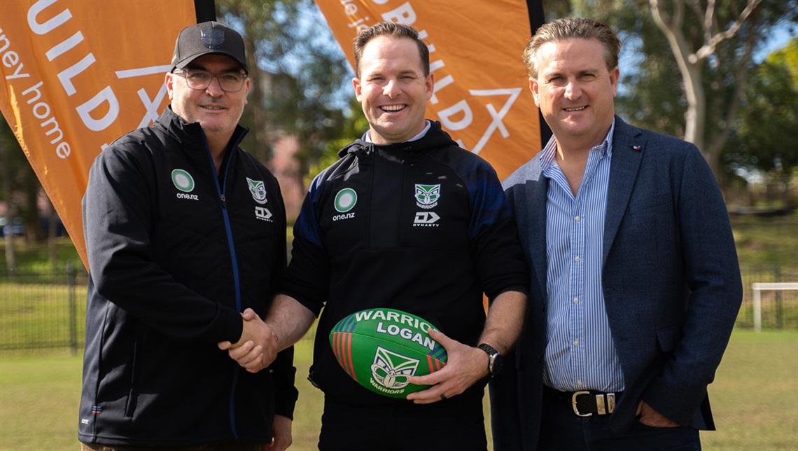 From left, celebrating the new rugby league arrangement are CEO of the New Zealand Warriors Cameron George, Logan Mayor Jon Raven, and Ausbuild Managing Director Matt Bell.
