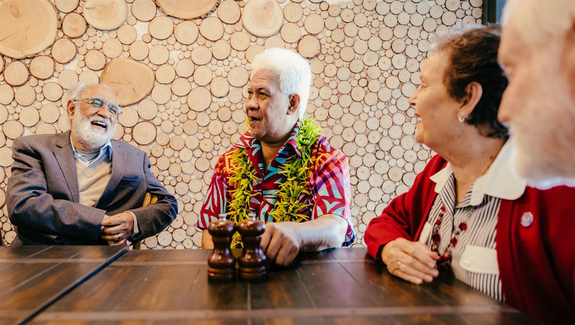 Seniors at a table talking