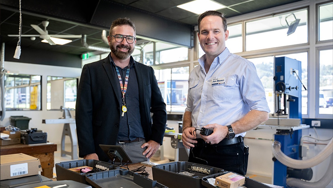 Logan Mayor Jon Raven takes a look over the new AI technology for live birdlife data with Park Ridge State High School Associate Principal Stuart Douglas.