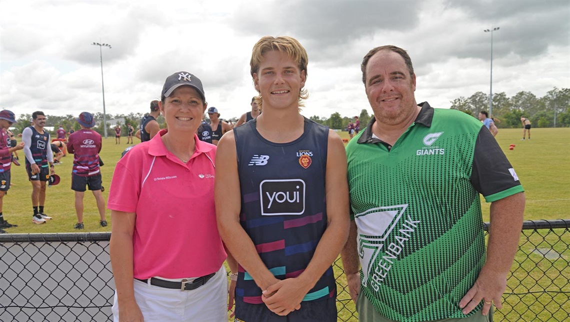 Cr Natalie Willcocks with Brisbane Lions star Will Ashcroft and Greenbank Giants president Chris Luxford