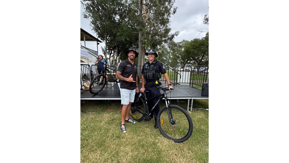 Cr Nathan St Ledger (left) delivers new mountain bikes to Acting Senior Sergeant Scott Behnke for use in local off-road patrols.