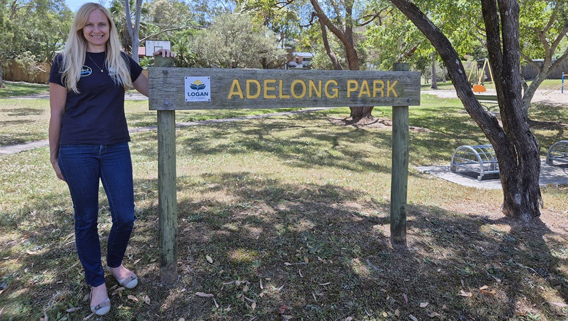 Councillor Miriam Stemp standing next to the Adelong Park sign