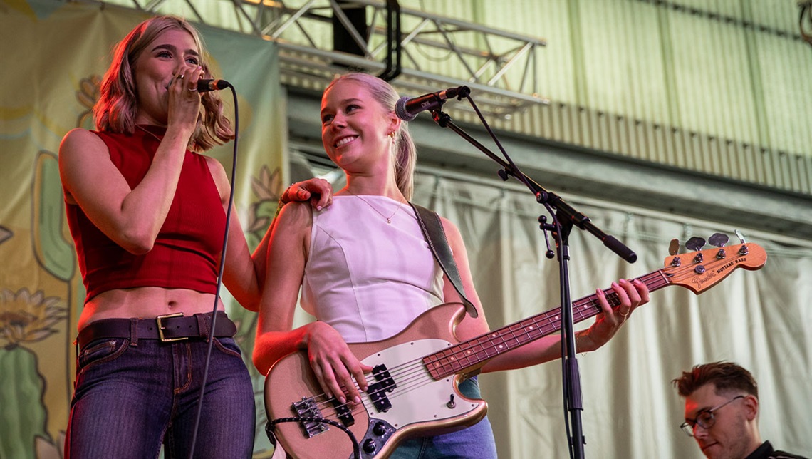 Ashlyn Dinsdale on the stage at the country music festival