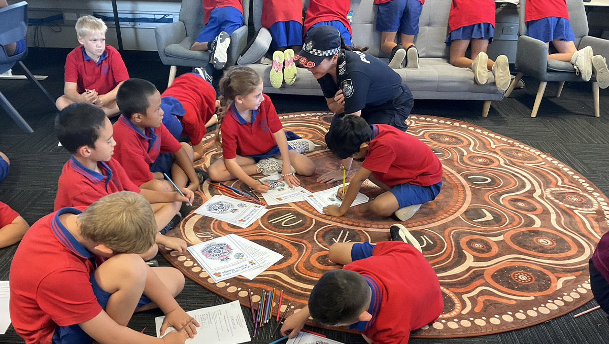 Children enjoying activities through the Adopt-A-Cop program at Waterford West State School.