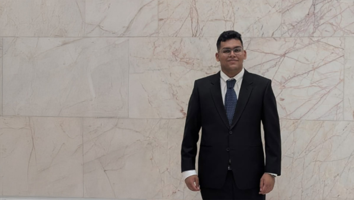 Man standing wearing a suit