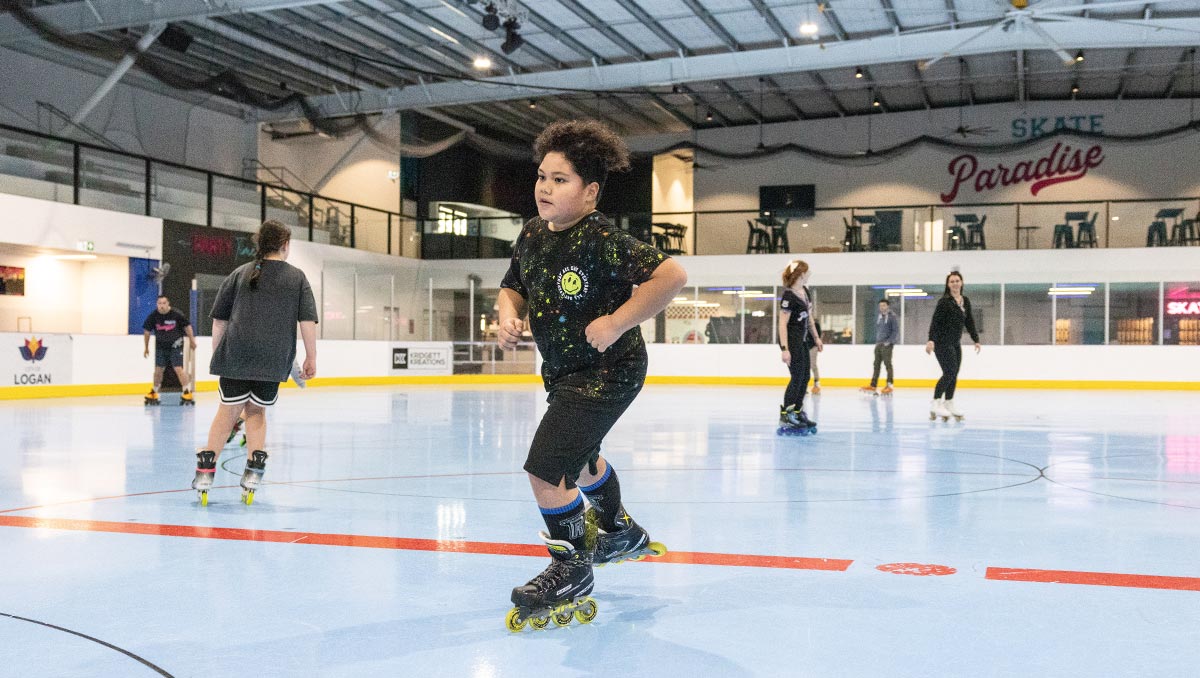Children skating on a roller skating rink