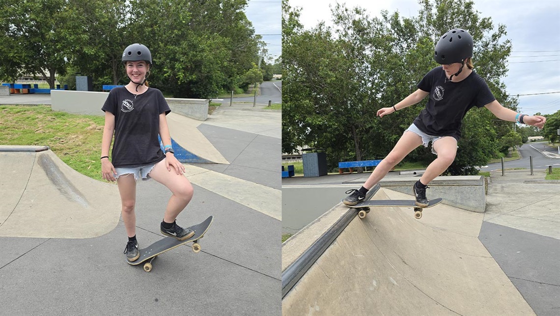 A girl doing tricks in a skatepark